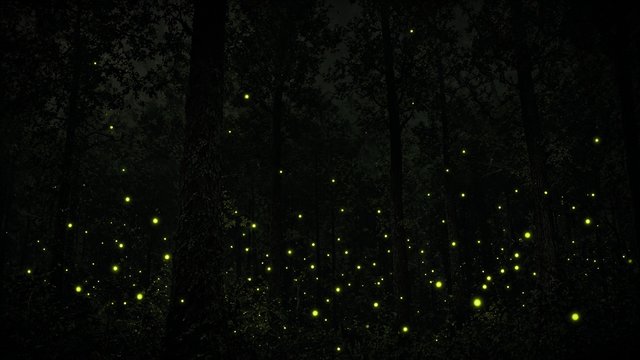 Silhouetted forest on pure black with dozens of tiny green-gold fireflies glowing among the trees, original AI dark AMOLED wallpaper