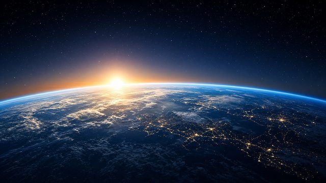 Sunrise over the curved horizon of a blue ocean planet seen from orbit, thin glowing atmosphere, city lights on night side, original AI space wallpaper